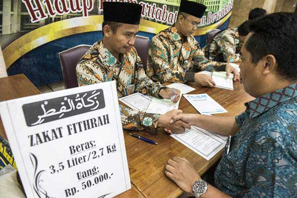 Hukum Membayar Zakat Fitrah Anak Tiri. Ini Doa Niat Zakat Fitrah Untuk Diri Sendiri, Keluarga dan Anak